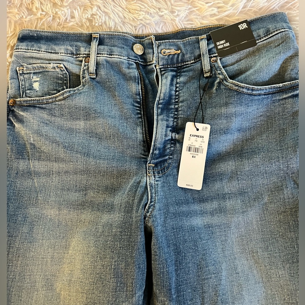 Express new w/ tags size 10R skinny high rise distressed jeans